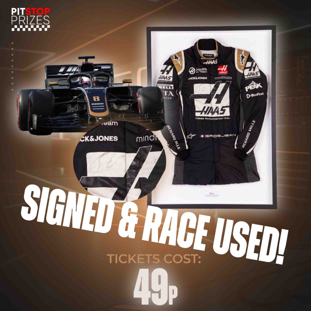 49p: ROMAIN GROSJEAN SIGNED, FRAMED & RACE USED SUIT!!